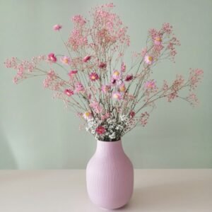Pink vase with flowers