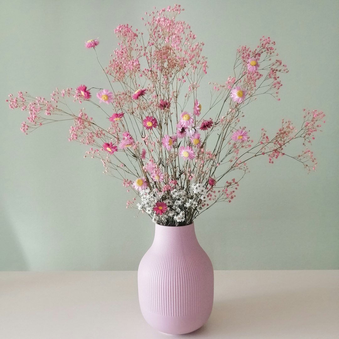 Pink vase with flowers