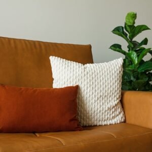 Living room with neutral rug and sofa
