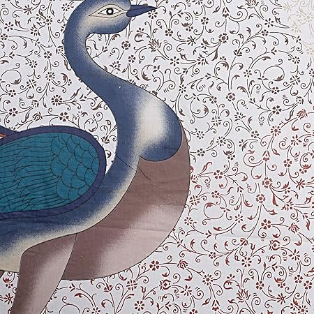 Close-up of blue-grey peacock print on white bedsheet with brown floral jaal pattern