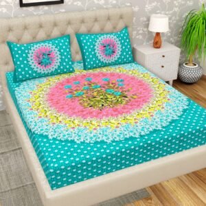 Teal polka dot double bedsheet with large pink and yellow floral medallion and matching pillow covers
