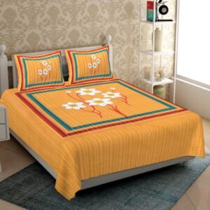 Mustard orange double bedsheet with white flowers in a teal and red frame and matching pillow covers