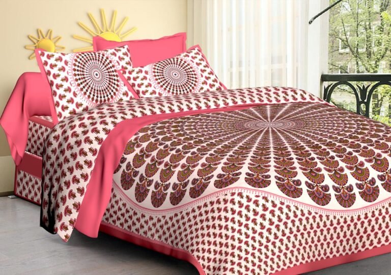 White double bedsheet with maroon peacock feather sunburst, pink band and mandala pillow covers