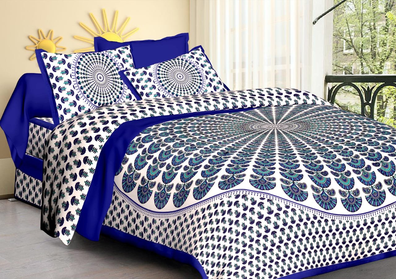 White double bedsheet with navy and teal peacock feather sunburst, royal blue band and pillow covers