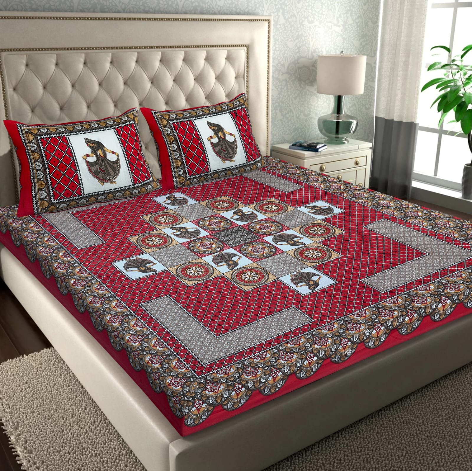 Red double bedsheet with Rajasthani folk dancer tiles in a rangoli layout and dancer pillow covers