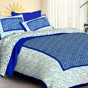 White double bedsheet with teal swirls and royal blue dotted circle motif panel with pillow covers