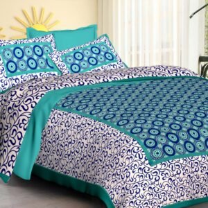 White double bedsheet with navy swirls and teal dotted circle motif panel with matching pillow covers