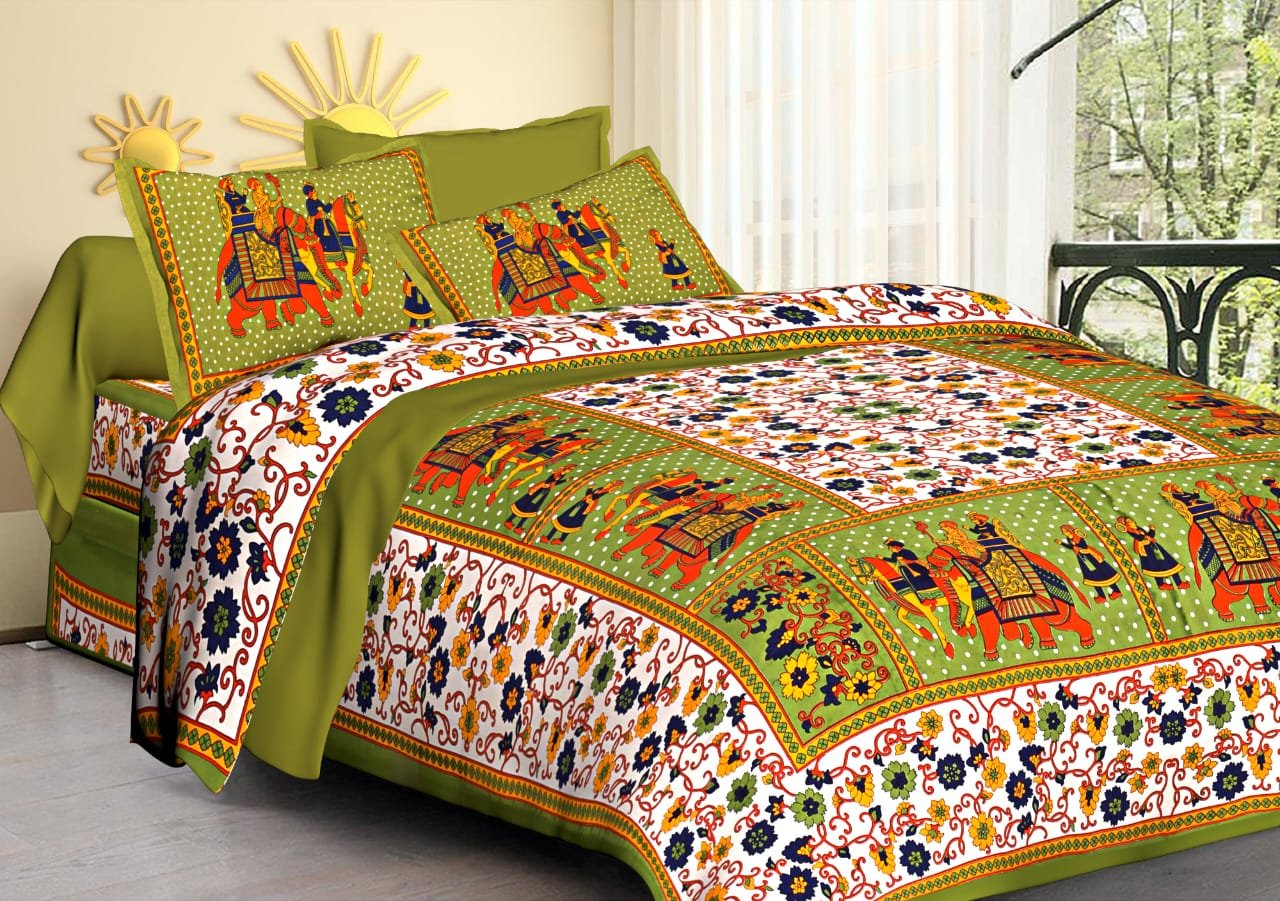 White floral double bedsheet with green Rajasthani elephant and rider panels and matching pillow covers