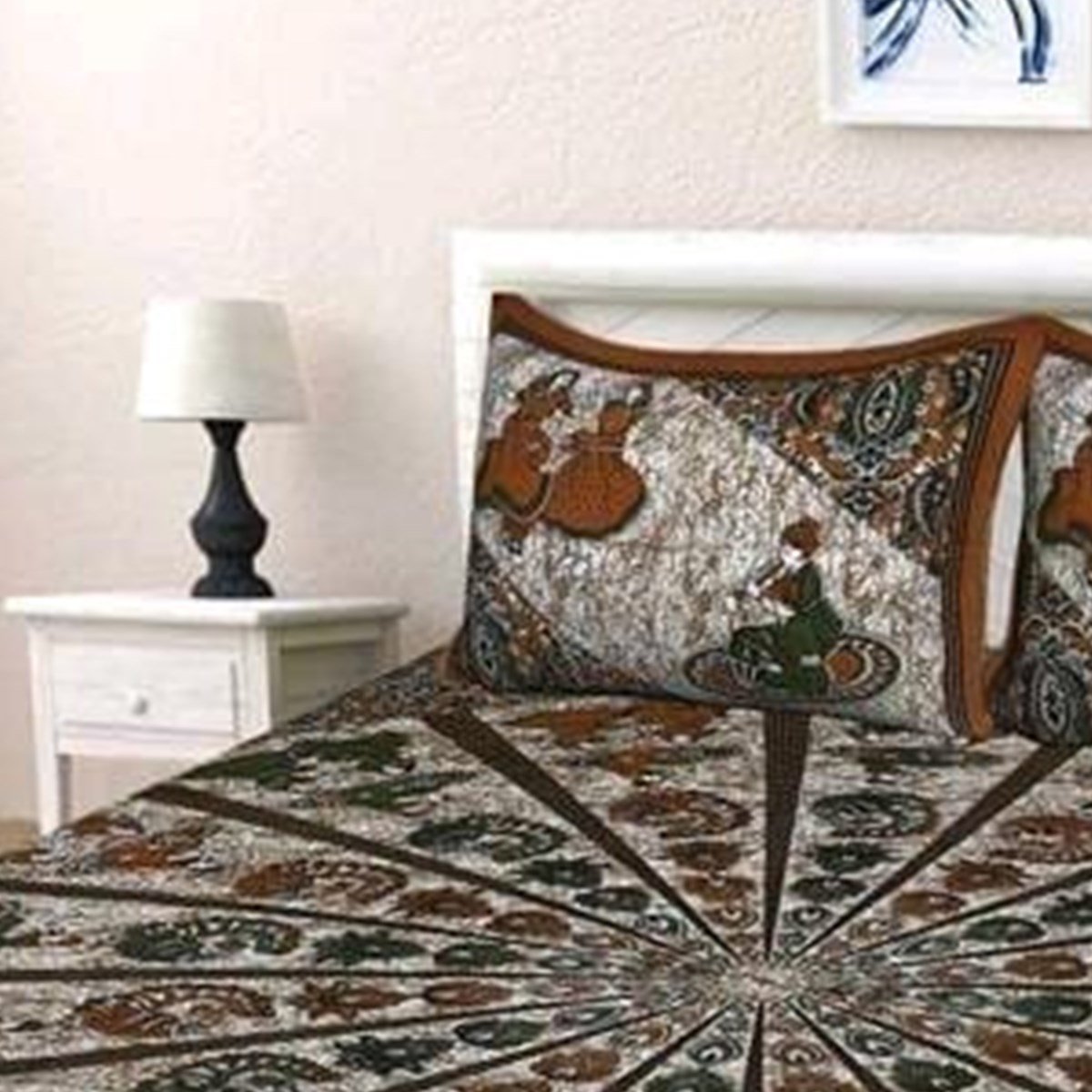 Pillow cover area of the Brown Rajasthani Folk Figure Radial Print Double Bedsheet